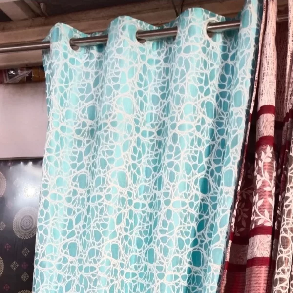 Blue curtains with loops on this giving luxurious look to your home