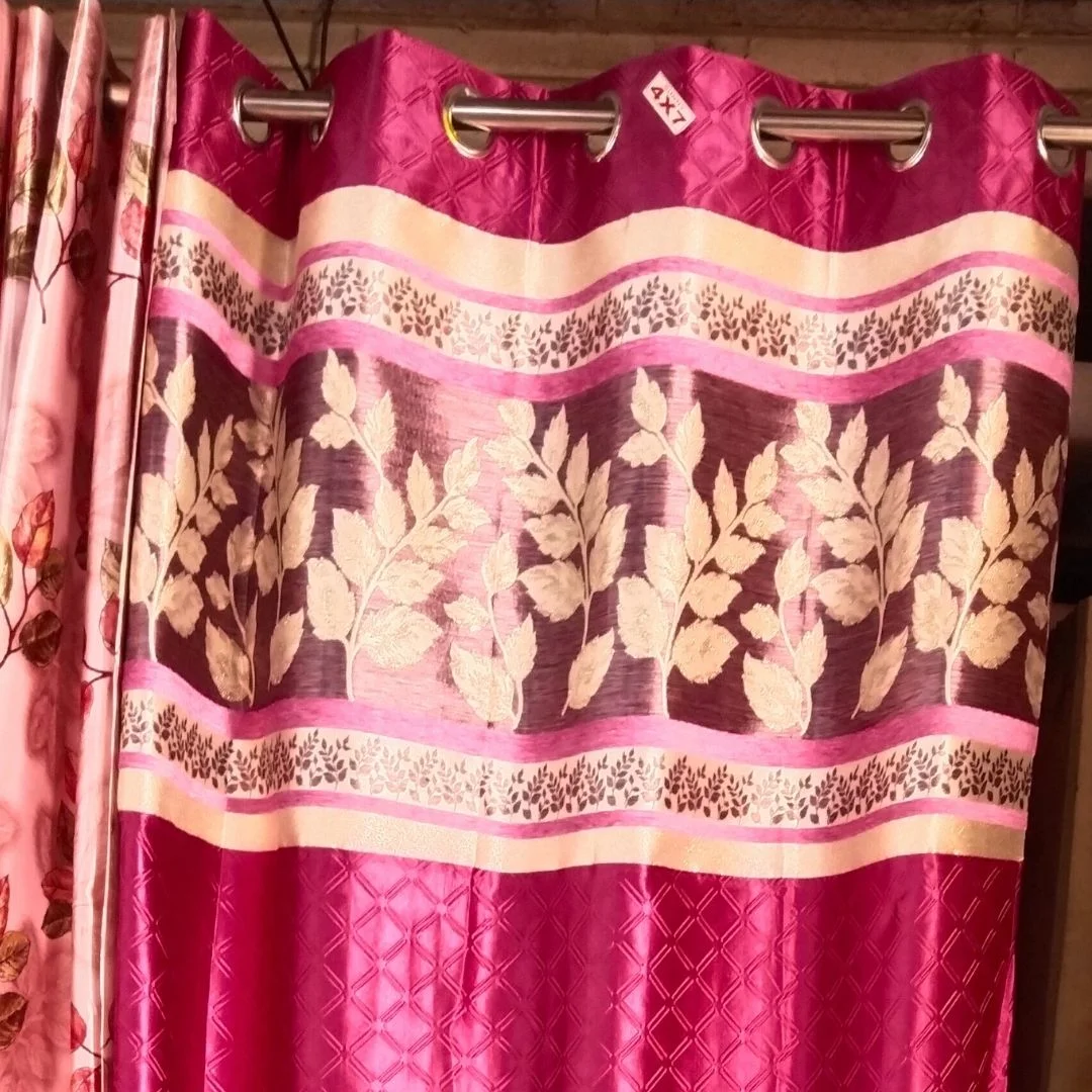 pink curtain with golden leafy print