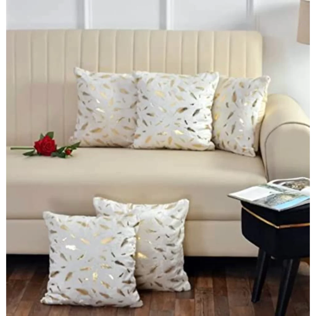 White cushion covers with golden leafy print, set of 5 in 600 rupees only